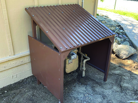 picture of Do It American meter shelter / ice guard installed adjacent to a house over the gas meter